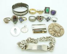 A collection of silver jewellery including rings, bangle, bracelet, brooch, etc