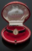 Omega 9ct gold ladies wristwatch ref. 150.919 with gold hands and baton markers, silver dial and