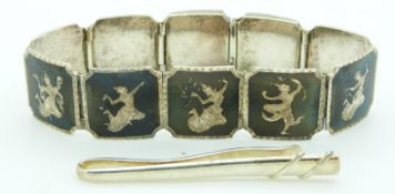 A silver Siam bracelet and silver tie pin