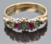 Victorian yellow metal ring set with foiled tourmaline and garnets with sphere decoration, size L