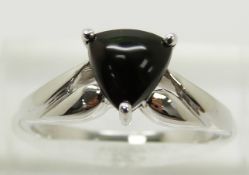 A 9ct white gold ring set with a trilliant cut Mezezo opal, 2.4g, size N