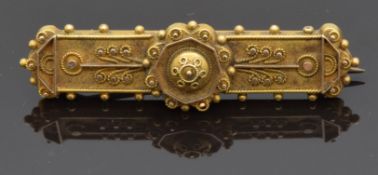 Victorian Etruscan Revival yellow metal brooch, 3.8g