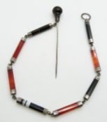 Victorian silver and banded agate cloak clasp, the single 10cm pin with polished agate top, the