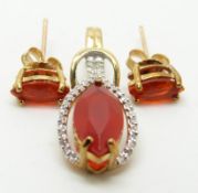 A 9ct gold pendant set with a marquise cut Salamanca fire opal and diamonds and a pair of 9ct gold