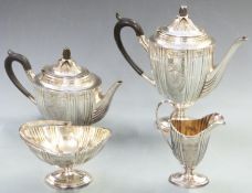 Walker & Hall four piece silver plated tea set in fitted oak box with brass cartouche to lid,