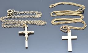 Two 9ct gold crosses and chains, 5.7g