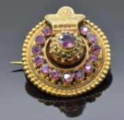 Victorian Etruscan Revival brooch with engraved and sphere decoration set with foiled garnets, verso