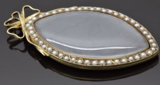 A large Victorian marquise shaped locket with a faux pearl border and bow decoration, maker A.W, 7.5