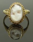 A 9ct gold ring set with a cameo, 3.22g, size P