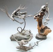 Three modern dragon sculptures in the manner of Walenty Pytel, height of tallest 50cm