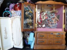 A collection of costume jewellery including beads, brooches, etc