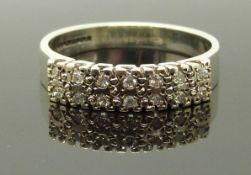 A 9ct white gold ring set with diamonds, size Q/R, 3.51g
