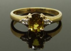 A 9ct gold ring set with citrine and diamonds, size N, 2.30g