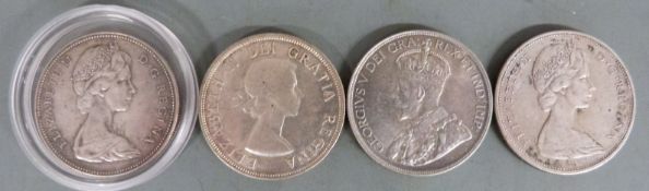 George V 1936 Canada dollar together with three further examples 1953, 1965 and 1967