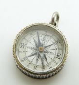 Victorian hallmarked silver compass charm, verso a seascape scene, Birmingham 1881, 2.4cm diameter