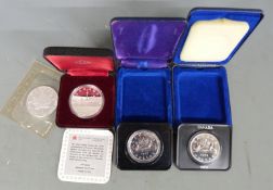 Canada 1oz silver maple leaf dollar coin 2004 together with a 150th anniversary Toronto example