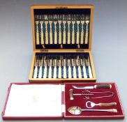 Cased twelve place setting dessert knife and fork set with ivory handles together with a retro