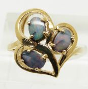 A 9ct gold ring set with three Australian boulder opals, 3.4g, size N