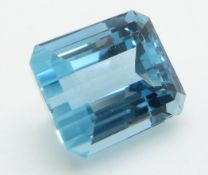 A loose emerald cut aquamarine measuring approximately 6.4cts