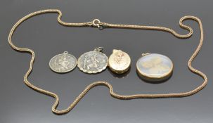 A 9ct gold necklace, a 9ct gold locket (6.3g), a pendant set with a four leaf clover and two