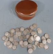 Approximately seventy silver threepences, some pre-1920, 98.0g, in a cuff link box