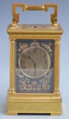 A c1900 brass cased carriage clock with half hourly repeater mechanism no 6828, the dial with