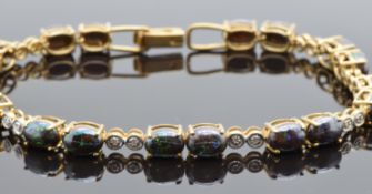 A 9ct gold bracelet set with Australian boulder opal cabochons and diamonds, 11.2g