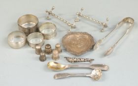 Three hallmarked silver thimbles, hallmarked silver pin tray with Reynolds Angel decoration, three