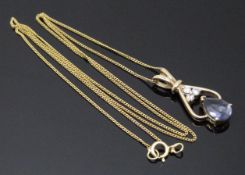 A 9ct gold pendant set with a pear cut amethyst and diamonds on a 9ct gold chain, 2g