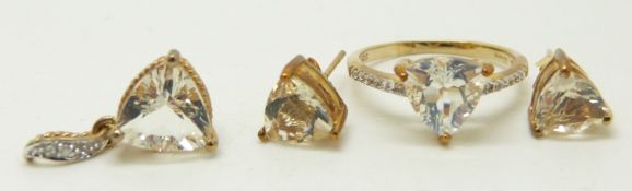 A 9ct gold ring set with a trilliant cut ice opal and zircons, a 9ct gold pendant set with a