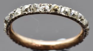Georgian / Victorian eternity ring set with old cut diamonds in a foiled setting, size F