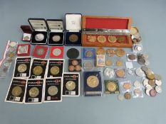 A collection of various coins and medal coinage to include R.A.F and flight related examples, a
