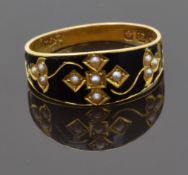 Victorian 18ct gold ring set with seed pearls in a cross design on black enamel ground, Birmingham