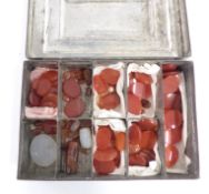 A collection of carnelian agate panels/ beads
