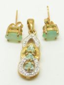 A 9ct gold pendant set with three Paraiba tourmalines and diamonds, and a pair of 9ct gold