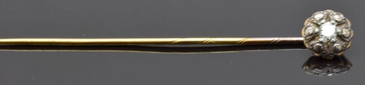Stick pin set with a diamond