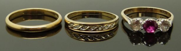 A 9ct gold wedding ring / band, a 9ct gold ring set with a synthetic ruby and paste and a 9ct gold