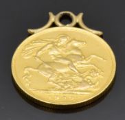 A 1909 gold full sovereign in pendant mount, 8.3g