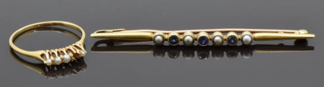 A 15ct gold brooch set with sapphires and seed pearls (3.6g) and a 9ct gold ring set with pearls (