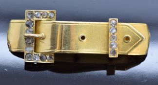 Victorian yellow metal buckle brooch set with rose cut diamonds, 4.2 x 1.4cm