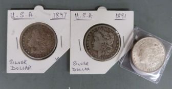 Three USA Morgan silver dollars, 1891, 1897 and 1921