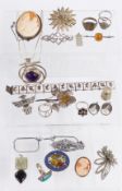 A collection of silver jewellery including brooches, pendants, cameo, rings etc