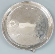 Victorian hallmarked silver circular salver with beaded edge, engraved decoration and raised on