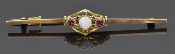A 9ct gold bar brooch set with section of a Victorian opal, tourmaline and garnet ring