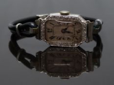 Rolex Art Deco platinum ladies wristwatch with diamond set and engraved case, blued hands, black