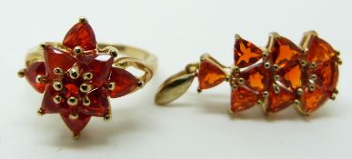 A 9ct gold ring set with eight trilliant cut Salamanca fire opals and a 9ct gold pendant set with