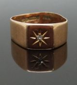 A 9ct rose gold ring with a diamond in star cut setting, size M/N, 3.56g