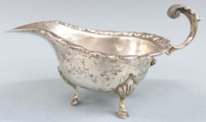 Egyptian white metal sauce boat, with Egyptian silver marks, length 17cm, weight 199g