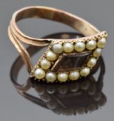 Georgian mourning ring set with hair in a central glass compartment surrounded by seed pearls,