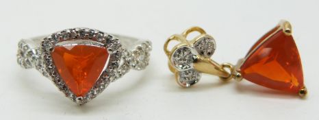 A 9ct white gold ring set with a trilliant cut Mexican fire opal and zircon and a 9ct gold pendant
